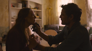 TLOU HBO Joel cleans Tess's injuries