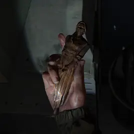 Whittled Statue front