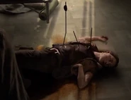 Leah's dead body in the TV Station.