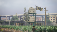 Water tower in the fields around the stadium, flying a WLF flag.