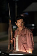Tommy with his rifle.