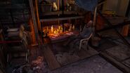 A smuggler drinking alcohol at his stall in the slums market.