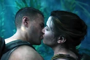 Owen and Abby kiss.