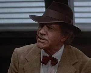 Centauri calls after Alex who is riding down a conveyor belt saying, "May the luck of the Seven Pillars of Gulu be with you at all times