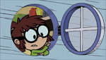Lisa opens the window in a side-way