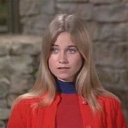 McCormick as her most known role, Marcia Brady in the Brady Bunch