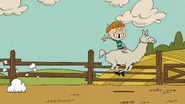 S5E20B Liam riding on the llama enjoying himself