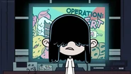 The show's title screen behind Lucy.