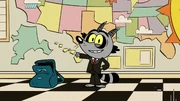 S8E04B Nacho dressed in a suit and waves hello