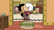 ...and kisses her.
