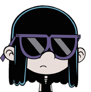 Lucy wearing sunglasses with a purple trim