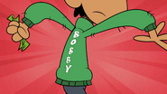 CS1E05B Bobby written in the green sweater