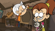 S4E21B Lincoln and Luan looking at their old stuff