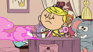 S4E19A Lola blow drying the glitter