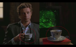 Jane holding Rosalind's tea cup (left), RJ has Rosalind's tea cup (right).