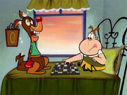 Penny playing checkers with Joey.