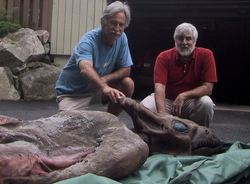 Patrick Huyghe and Loren Coleman with the prop.