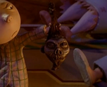 The shrunken head still on the boys hand