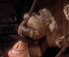 Corpse Kid looking up at Santa