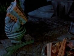 Throwing a present into the pile