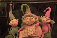 Close up of the storybook Christmas Town elves.