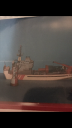 Baddeck in display with two buoys