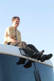 Dwight sitting on the bus