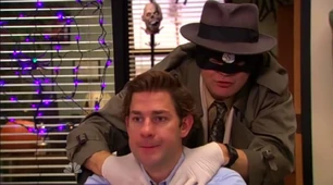 Dwight pretending to strangle Jim