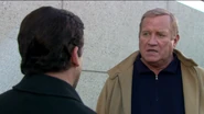 Ed Truck talking to Michael in "The Carpet", Season 2, Episode 14.