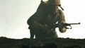 Basilone carrying a Carbine in Iwo Jima.