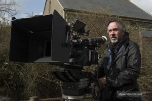 Behind the Scenes Shot of Director Tim Burton operating a camera