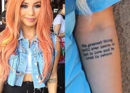 Her fifth tattoo was a quote on her left forearm that reads: "The greatest thing you’ll ever learn is just to love and be loved in return".