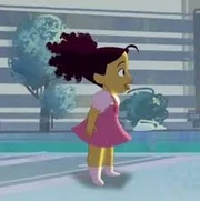 Penny as a baby playing basketball with her dad