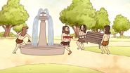 S4E17.176 Cavemen Bring a Bench to the Fountain