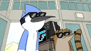 S6E19.063 Mordecai and Rigby Entering the Mall