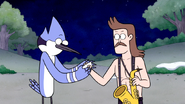 S6E11.052 Sad Sax Guy Gives Mordecai a Business Card