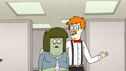 S7E25.049 Receptionist Showing Muscle Man His Cubicle