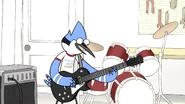 Mordecai wearing a "Mordecai and the Rigbys" t-shirt in "Mordecai and the Rigbys"