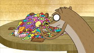 S3E04.249 Rigby Going Through His Candy