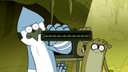 S6E19.171 Mordecai and Rigby Putting in the Cartridge Together