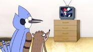 S7E04.073 Mordecai and Rigby Watching the News