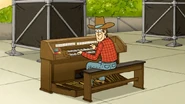 S6E17.193 Farmer Jimmy Happily Playing the Organ