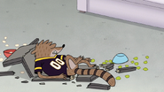 S6E13.013 Rigby Laying on the Broken Table Defeated