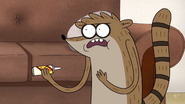 Rigby holding Supe De Glup