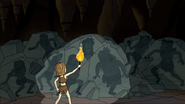 S4E17.153 Diane Holding a Torch on the Other Cavemen