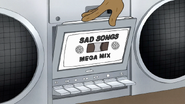 S7E36.115 Rigby Putting in Sad Songs Mega Mix