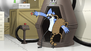 S8E17.037 Rigby Trying to Get Into the Teleporter Pod