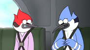 S6E20.183 Mordecai Trying to Remove His Seat Belt