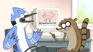 S7E07.013 Mordecai and Rigby Introducing Cat Videos to Benson