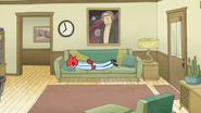 S6E25.009 Margaret Laying Face Down on the Couch